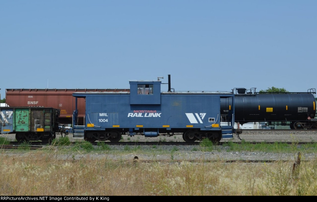 Montana Rail Link Caboose 1004 on a MofW Train - Columbus, Montana